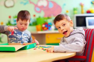 Two boys with disability at kindergarten