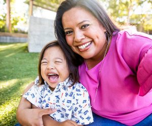 Mother and son smiling and laughing.